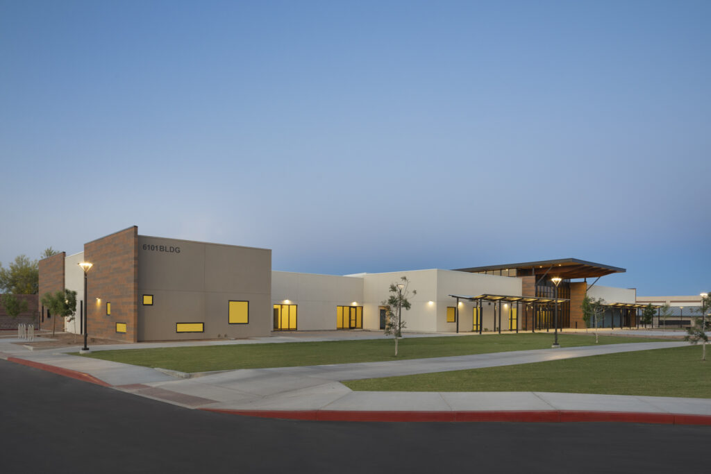 Exterior of church campus with grass on front lawn.