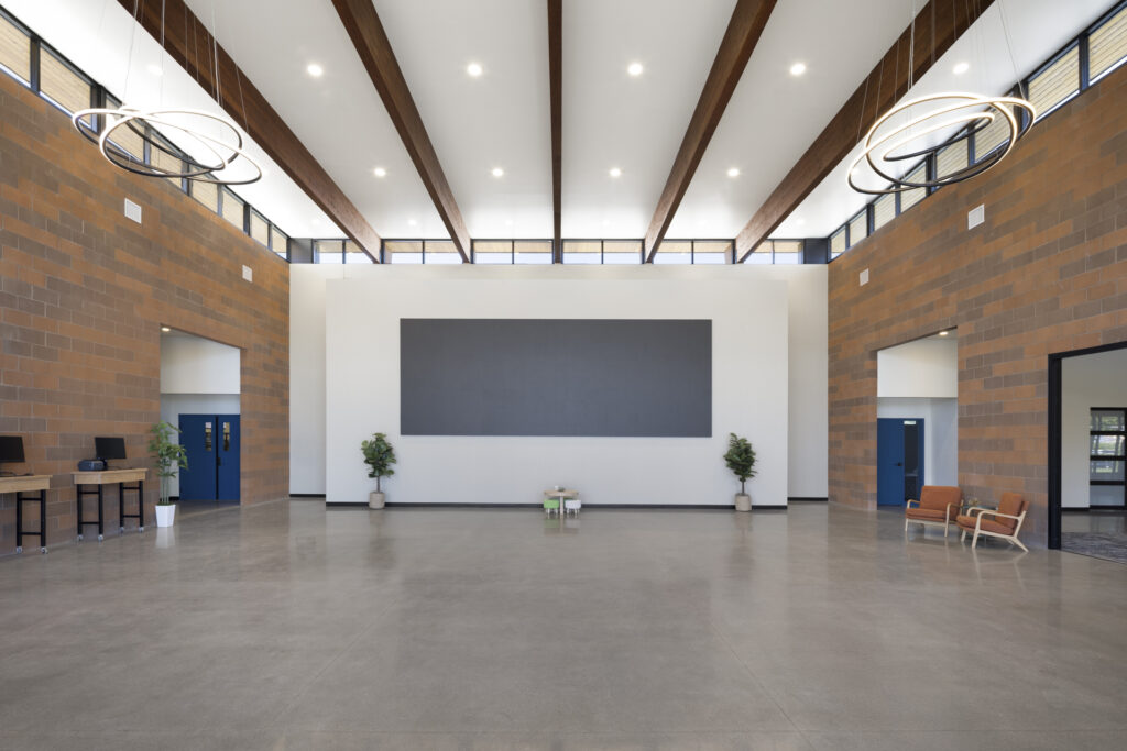 Interior of open space with large screen.