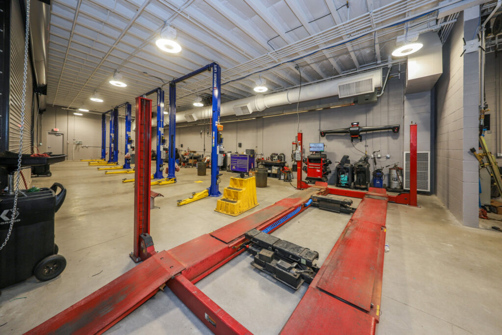 Interior of car service bay with red frame