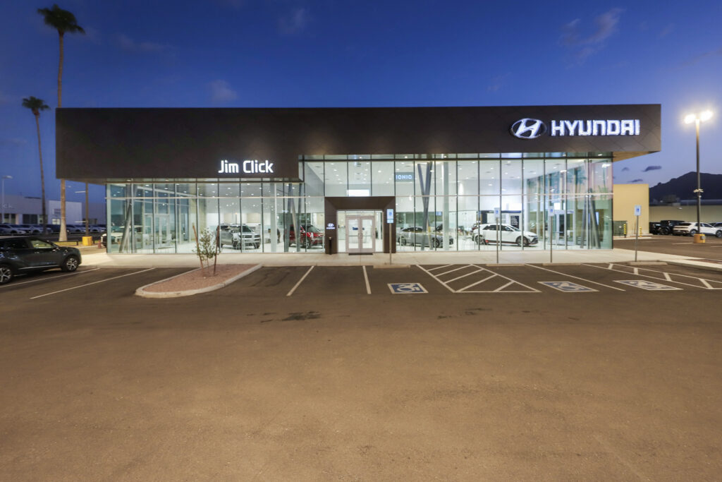 Exterior of car dealership with large Hyundai sign