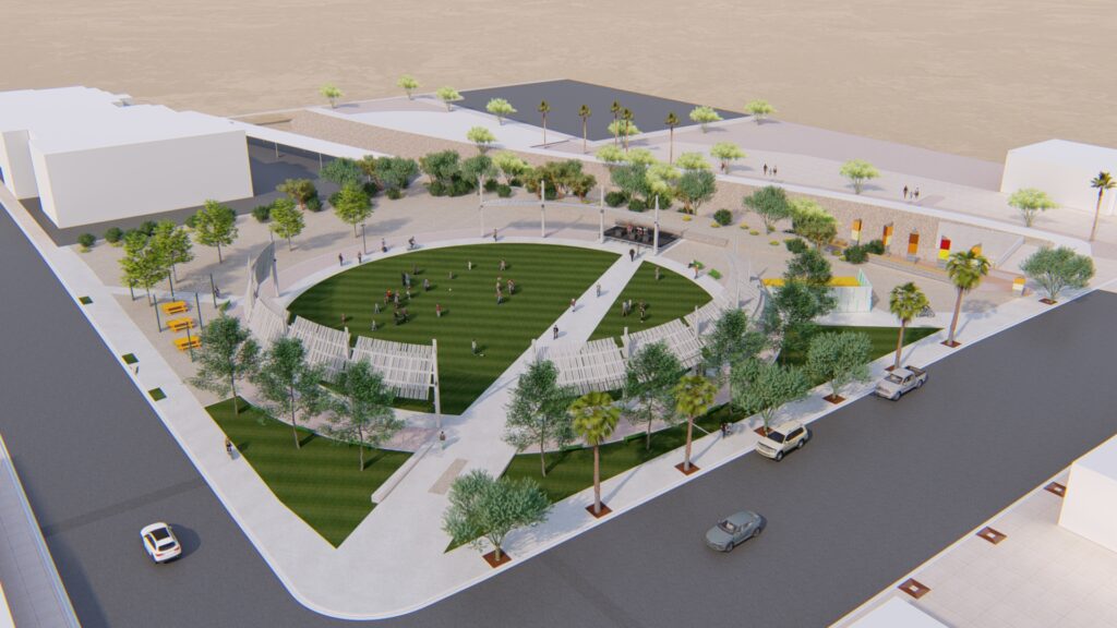 Aerial view of a circular outdoor park space with grass, a center walkway, and trees surrounding the perimeter.