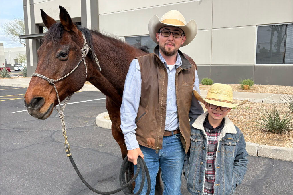 superintendent rueben and his son colt with their horse before they went on their pony express